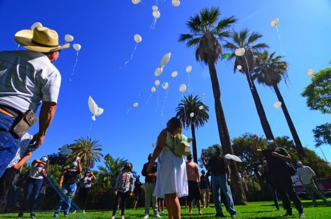 Family members and friends release balloons into the sky in a symbolic gesture honoring the memory of murdered El Camino College student, Juan Carlos Hernandez outside the church grounds at the Saint Vincent de Paul Parish on Wednesday, Sept. 22, 2021. We released the balloons as a symbol of our love for Juan. Sending our love, our prayers and thoughts," Hernandez&squot;s mother Yajaira Hernandez said. "It represents family, unity and love. Every balloon that was released had a little bit of our pain in it. The loss of an amazing son, brother, cousin and friend."