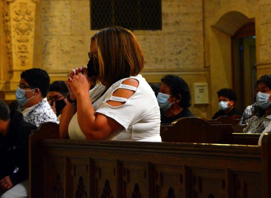Juan Carlos Hernandezs mother, Yajaira Hernandez, prays during the memorial mass held in remembrance of her son at the Saint Vincent de Paul Parish in Los Angeles on Wednesday, Sept. 22, 2021. Photo by Jose Tobar/The Union Photo credit: Jose Tobar