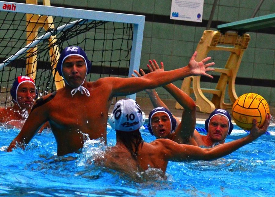 El Camino College men’s water polo, utility, Evan Diaz, blocks an incoming shot from Chaffey Panthers’ center forward during their last conference game at Santa Monica College Swim Center on Friday, Oct. 22. The Warriors defeated the Panthers 13-9.