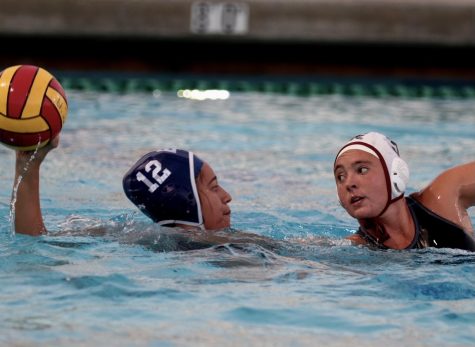 El Camino College Warriors Utility Brittany Sanchez (Fr.) attempts to shoot the ball into the goal during a South Coast Conference match up against Chaffey College at the Torrance Aquatics Center in Torrance, CA on October 27, 2021. Sanchez scored a goal, helping the Warriors defeat the Panthers 11-6.