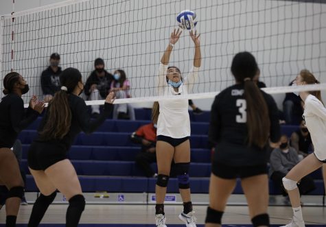 Jayden Zabala sets the ball during a match against the Tartars of Compton College, Torrance, CA, Friday, October 18, 2021. The Warriors defeated the Tartars in 3 sets (25-6, 25-5, 25-4)