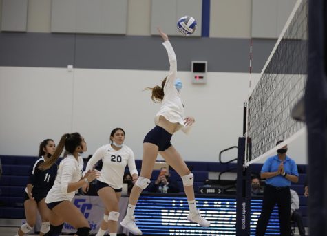 Freshman MB Adelynn Abrams goes up for a middle attack during a home game against Compton College, Torrance, CA, October 18, 2021, Monday. Abrams recorded 7 kills, 2 aces, and one dig, helping the Warriors defeat Compton in 3 sets (25-6, 25-5, 25-4).