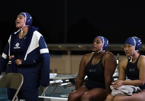 From outside the pool, El Camino's Marlene Bartes (So.), Devi Bose (Fr.), and Megumi Watanabe (Fr.) supporting their team plays in a South Coast Conference matchup against Chaffey College. The Warriors defeated the Panthers 11-6.
