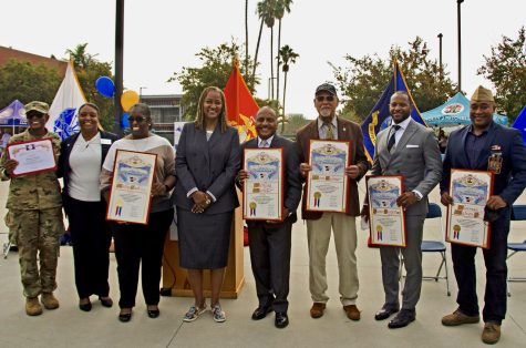 EL Camino College President Brenda Thames, second from left and Los Angeles County Supervisor, Holly J. Mitchell, fourth from left, pose for a picture with honorees during the Veterans and Community Thanksgiving event on Wednesday, Nov. 17, at ECC. Photos by Jose Tobar/The Union