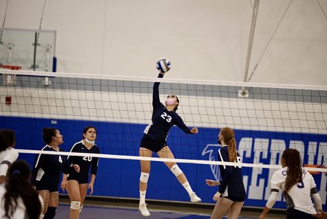Freshman OH Leafa Juarez goes for a kill during a game against Cerritos at the Cerritos College gymnasium on Nov. 4. El Camino defeated Cerritos 3-2, and will face East Los Angeles on Nov. 6 for a conference showdown.