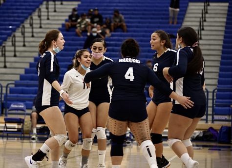 El Camino Warriors celebrate a point in the fifth set against a South Coast Conference game against Cerritos at Cerritos College on Nov. 4. The Warriors defeated Cerritos and will face East Los Angeles on Nov. 6 for another conference showdown.