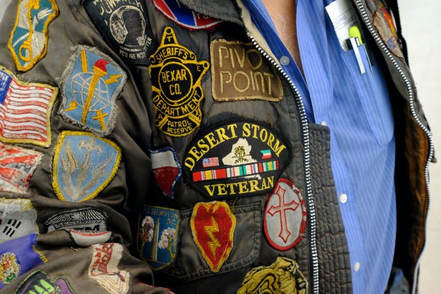 A detail of the many patches that army veteran and photographer, Christopher Xavier Lozano, 58, has woven into his jacket over the course of his military career. “You can point to any patch and I could tell you every story behind it,” Lozano said. Photo by Jose Tobar/The Union