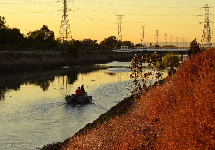 Workers from the Ocean Blue Environmental Services, Inc., spray the Dominguez Channel with Epoleon, an odor neutralizer that converts hydrogen sulfide into salt, just off Chico and 213th street in Carson on Saturday, Nov. 13. Photo by Jose Tobar/The Union
