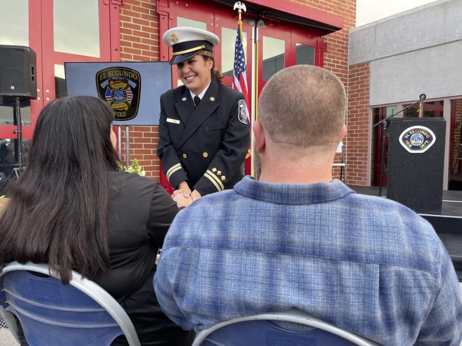 Deena Lee speaks with family and friends who came to her swearing in as the City of El Segundo's new fire chief, Dec. 7 at Fire Station 1 in El Segundo, Calif. Photo by Kim McGill/The Union