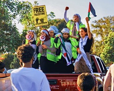 Palestinian girls protest against the occupation of Palestine in Anaheim, California. The protest was held in collaboration with CSULB and the Palestinian Youth Movement on Friday, May 21.