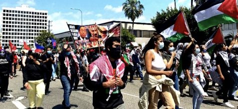 Thousands of civilians gather together during a Palestinian protest and march through Wilshire Boulevard to commemorate the 73 years of the Nakba in Los Angeles on Saturday, May 15.