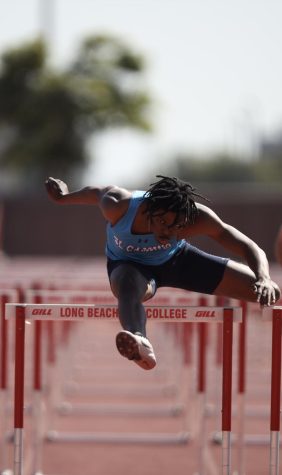 Dominic Britton clears a hurdle in the men's 110mh. Britton won the event with a time of 14.94. The Warriors will be at the RCC Open at Riverside City College in Riverside on March 18. Photo by Greg Fontanilla/The Union