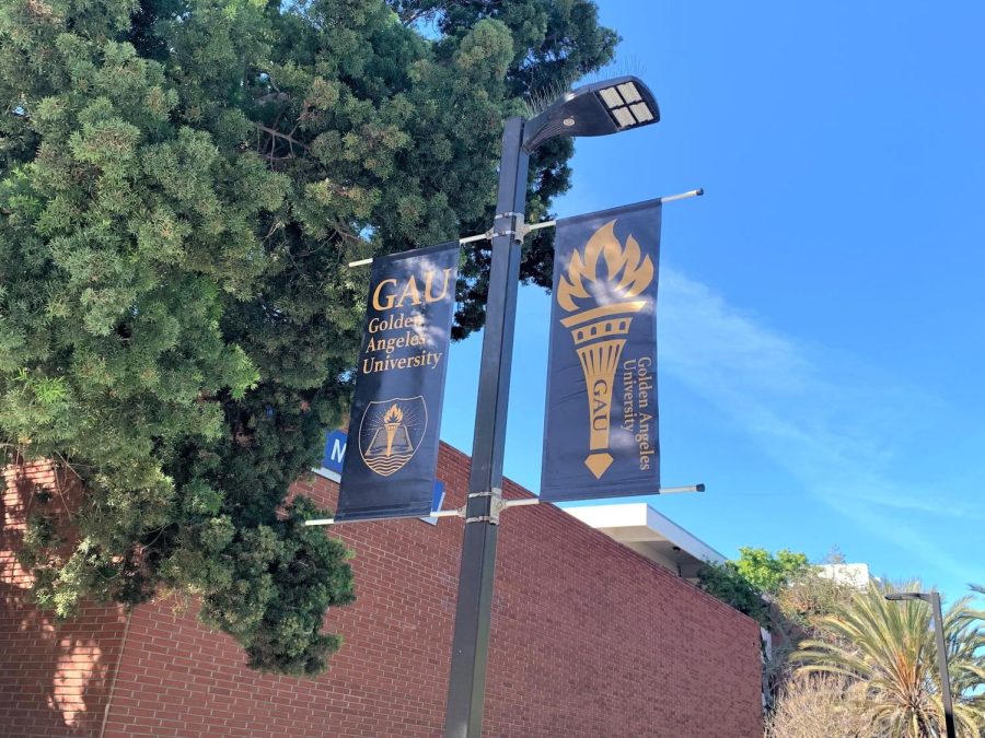 Golden Angeles University banners that replaced our El Camino College banners for the filming of All American, located outside the HAAG Recital Hall and Music Building, March 17. There are several of these new banners located around campus. (Margarita Sipaque | The Union)