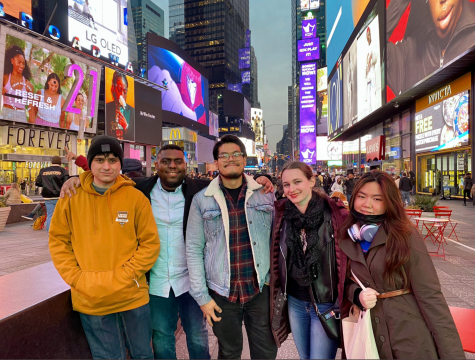 Delfino Camacho (center) and his fellow The Union publication staff/students from El Camino College pose for a group photo in Times Square, New York after finishing up a day full of workshops and before setting out to explore the city on Wednesday, March 10. With Camacho stands Nicholas Broadhead (far left), Khoury Williams (left), Elizabeth Basile (right) and Maureen Linzaga (far right). (Photo provided by Stefanie Frith | The Union)