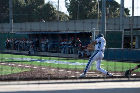 El Camino College Warriors second-baseman Daniel Murillo hits a ground ball against the Santa Barbara City College Vaqueros on Tuesday, March 1, 2022 at Warrior Field. Murillo ended with one hit on five AB's (at-bats) in the 8-2 win over the Vaqueros. (Union Photo: Naoki Gima).