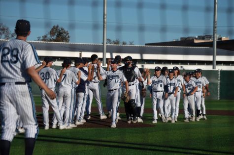 The El Camino College Warriors celebrate a win over the Santa Barbara City College Vaqueros on Tuesday, March 1, 2022 at Warrior Field. The Warriors put up a six run eighth inning to cap off the win, the final score being 8-2. (Union Photo: Naoki Gima).