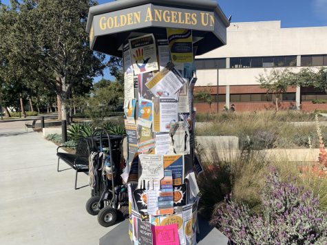 Golden Angeles University news stand prop located next to Administration Building, March 17, 2022. El Camino College is the "set" for All American&squot;s Golden Angeles University.
