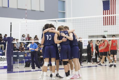 The El Camino College Warriors come together in a group huddle before the start of their next play against the Long Beach City College Vikings during the CCCAA State Semifinals at the El Camino Gym on Thursday, April 21. The Warriors would ultimately lose the match to the Vikings after four hard fought sets. (Ethan Cohen | The Union)