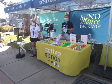 Active Minds, the nonprofit organization responsible that holds the Send Silence Packing event hold their own booth on the Library Lawn at El Camino College on Monday, April 4. Active Minds has done this event all across the country for over a decade. (Charlie Chen | The Union)