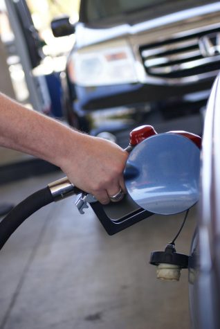 A driver fills up his car tank at a Costco gas station in Hawthorne California on March 8, 2022. After the Russian invasion to Ukraine, gas prices in the U.S. have been going up, in some places in the Golden State the cost is nearly $8 gallon. (Photo: Alexis Ponce)