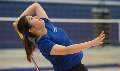El Camino College Badminton player Marina Mongaki reaches back for a smash shot during a game against Irvine Valley College in the El Camino Gymnasium on Friday, April 1. Mongaki was able to (Naoki Gima | Union Photo).