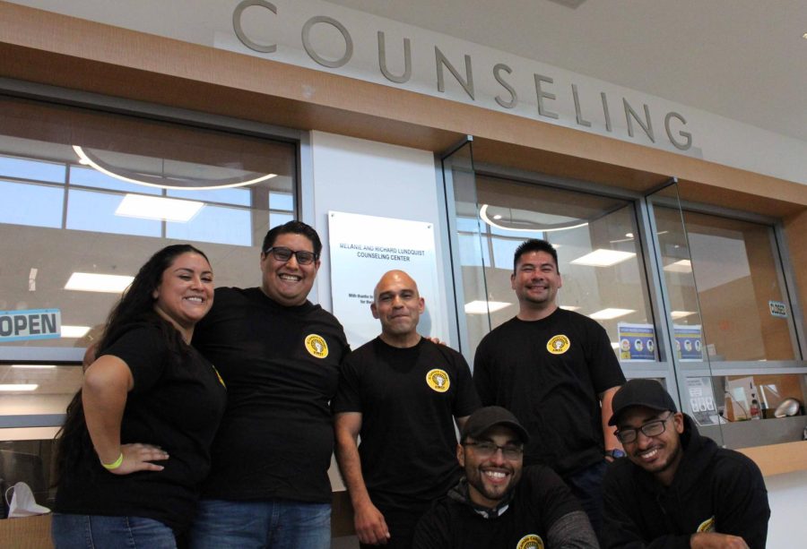 Staff and members of the El Camino College Formerly Incarcerated Re-Entry Students Thriving (FIRST) Program outside their office located in the Counseling Center on the second floor of El Caminos Student Services building on Thursday, April 14. Since its start in 2019, FIRST has supported 56 formerly incarcereted or system impacted students to register for classes; access financials aid; connect to resources for housing, income assistance, food and clothing; prepare to tranfer to a university and/or career; and to navigate the often confusing, discrimnatory and challenging re-entry process. Pictured here are (L to R) Isabel Gonzalez, FIRST success coach, Ricky Gonzalez, FIRST program coordinator, Luis Medina, Pablo Giron, Eduardo Dumbrique and Gerardo Diaz. (Kim McGill | The Union)