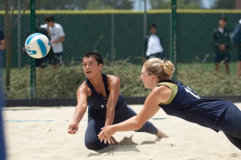 El Camino College Warriors Women's Beach Volleyball players Fayth Rascon (left) and Lauren McCarthy (right) both dive for the ball before it hits the sand during a game against Long Beach City College at El Camino College in Torrance, Calif, on Tuesday, May 3, 2022. Rascon and McCarthy won two sets en route to the 3-2 overall victory for the Warriors. (Naoki Gima | Union Photo).