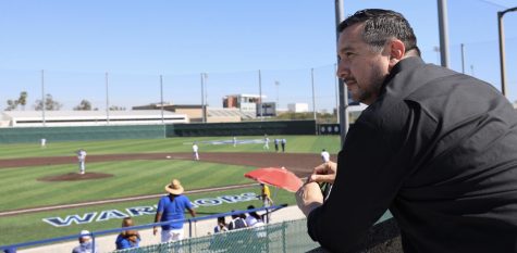 Beto Duran overlooking a baseball game between the El Camino College Warriors and the Harbor College Seahawks at ECC's Warrior Field on March 22, 2022. Beto played baseball and ran cross country in high school. (Greg Fontanilla | Warrior Life)