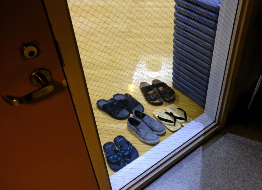 Before entering the Torrance Naginata Dojo, Helen Nakano and her students remove their shoes and sandals before practice. (Jose Tobar | Warrior Life)