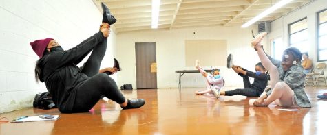 Tamara Kemp leads her tap-ballet Saturday dance class through stretching exercises on April 2, 2022. This was her first class back from the COVID-19 virus shutdown. Tamara taught her first youth dance class in 2001. (Gary Kohatsu | Warrior Life)