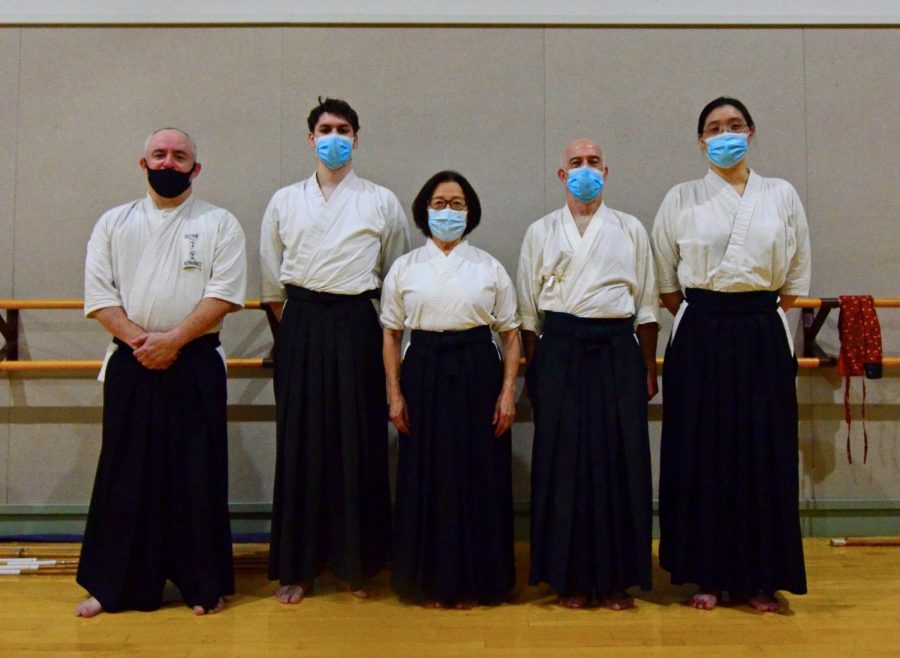 Members of the Torrance Naginata Club lined up in the dojo with Helen Nakano in the center on Thursday, Oct. 21, 2021, at the Torrance Cultural Arts Center. (Jose Tobar | Warrior Life)
