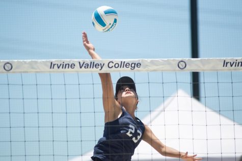 El Camino College Warriors Women's Beach Volleyball player Leafa Juarez reaches back to hit the ball over the net during a playoff matchup against Irvine Valley College at Irvine Valley College in Irvine, Calif, on Thursday, May 12. Juarez, alongside partner Brea Rutledge, would fall to Irvine Valley College. (Naoki Gima | Union Photo).