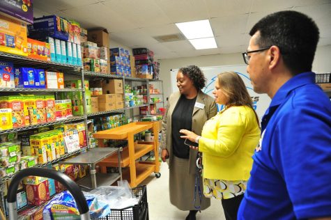 El Camino College President Brenda Thames, left, visits with Kim Cameron of the El Camino Warrior Pantry and Greg Toya, director of the Student Development Office on April 21. The Warrior Pantry is open Tuesday's and Thursday's from 11 a.m. to 2 p.m. Gary Kohatsu | Warrior Life