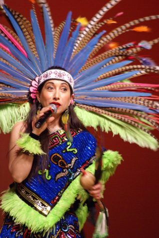ECC Spanish Professor Argelia Andrade, welcomes the audience to the event "A Celebration of Chicano Culture 2022" at the Marsee Auditorium, in Torrance, Calif., on Wed. May 18. Andrade is a performer herself from "Nuestras Raices" dance ensemble.(Alexis Ponce | The Union)