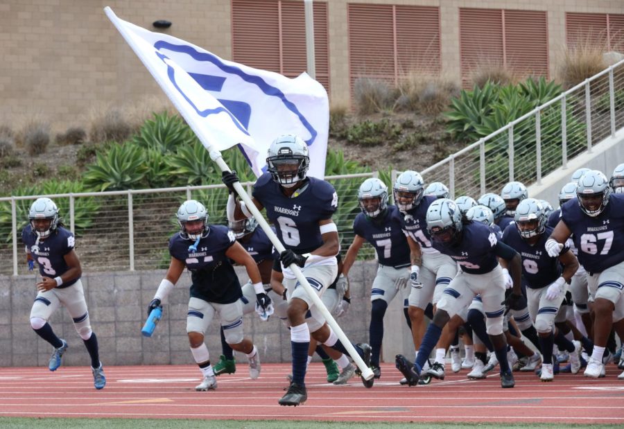 El Camino Warriors get ready to take the field for their game against Bakersfield on Saturday, September 10 at Featherstone Field in Torrance. The Warriors defeated the Renegades 30-20, and will play on the road against Ventura College on September 17. (Greg Fontanilla | The Union)