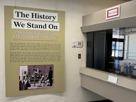 Poster that is a part of "The History We Stand On" exhibit in the El Camino College library lobby, Thursday Sept. 8, 2022. It explains what the exhibit strives to explore and features an image of the unveiling of the "Warrior Statue". (Delfino Camacho | The Union)