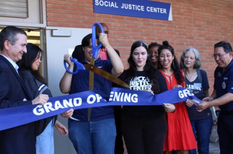 Matt Schwarz cuts the ribbon, opening the new Social Justice Center at El Camino College on Sept. 28. Kitzia Lopez and Schwarz were among the student leaders that pushed for the centers creation. (Kim McGill | The Union) 