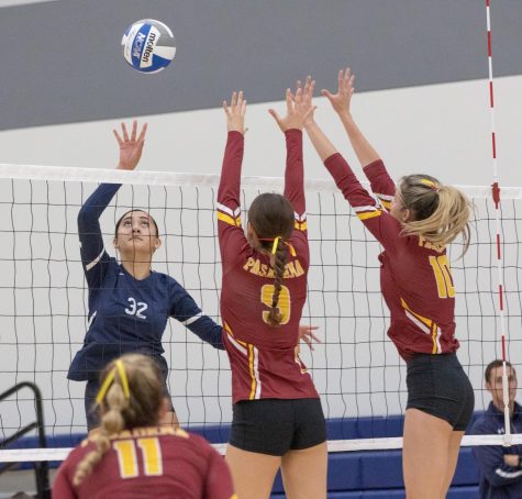Warriors' outside hitter Leafa Juarez jumps to position the ball over a Lancers' block at the ECC Gym Complex on Friday, Sept. 16. Juarez posted a staggering 28 kills in the match against the Lancers, tying the leading ECC record. (Ethan Cohen | The Union)