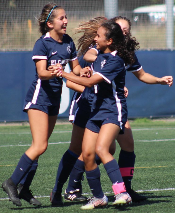 El Camino College Warriors forward Bella Baligad (L) celebrates her goal with midfielder Angelica Taylor on Tuesday, Oct. 4 at ECC Soccer Field. The Warriors defeated the Cerritos College Falcons 3-1 in the South Coast Conference opener. (Elsa Rosales | The Union)