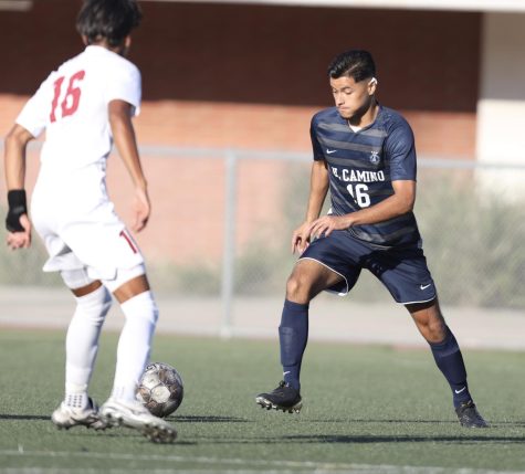 El Camino freshman forward Alek Palomares attempts to get the ball around a Pasadena City defender during an Oct. 18 home game. El Camino defeated Pasadena 5-0, and will face East Los Angeles at home on Friday, Oct. 21 at 4 p.m. (Greg Fontanilla | The Union)