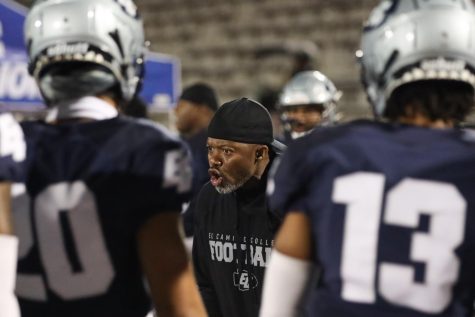 El Camino defensive backs coach Shawn Parnell instructs his defense during a National Division Central Conference home game against Cerritos at Featherstone Field on Saturday, Oct. 22. Cerritos upset