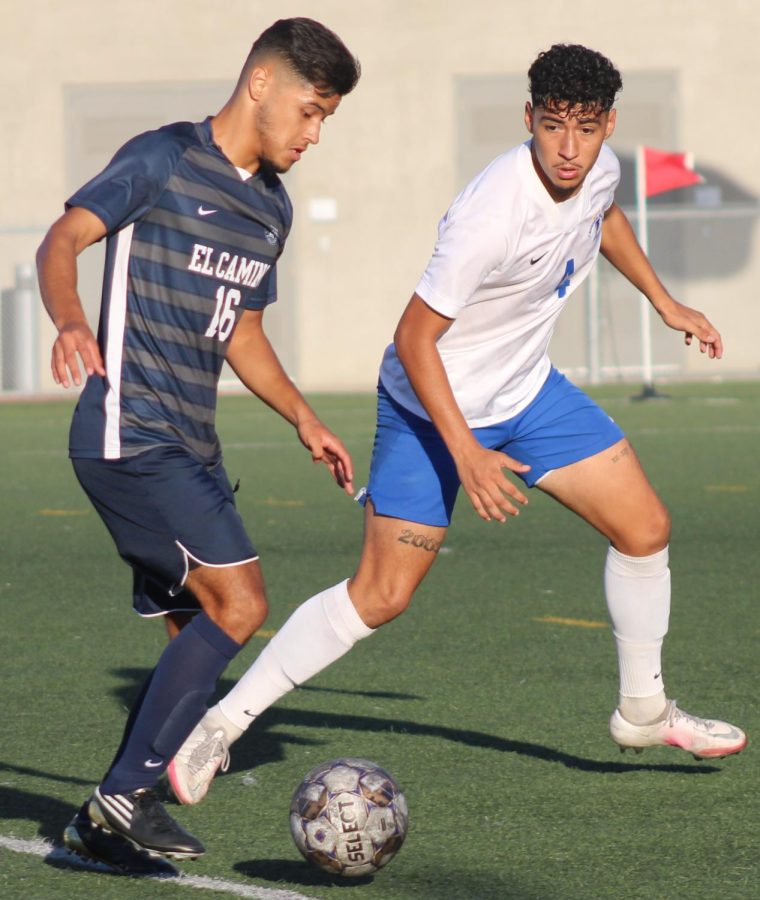 El+Camino+College+Warriors+forward+Alek+Palomares+%2816%29+takes+the+ball+downfield+past+Cerritos+College+Falcons+defender+Jaret+Rocha+during+a+conference+matchup+at+home+on+Oct.+4.+The+Warriors+were+defeated+4-1+and+will+play+on+Friday%2C+Oct.+7%2C+on+the+road+against+the+Los+Angeles+City+College+Cubs.+%28Elsa+Rosales+%7C+The+Union%29
