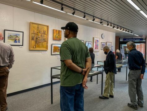Many visitors came to see the artwork that tells the story of the Japanese Americans in the camps. The event was held on Oct. 13 from one to three p.m. at the El Camino Library. (Ash Hallas | The Union)