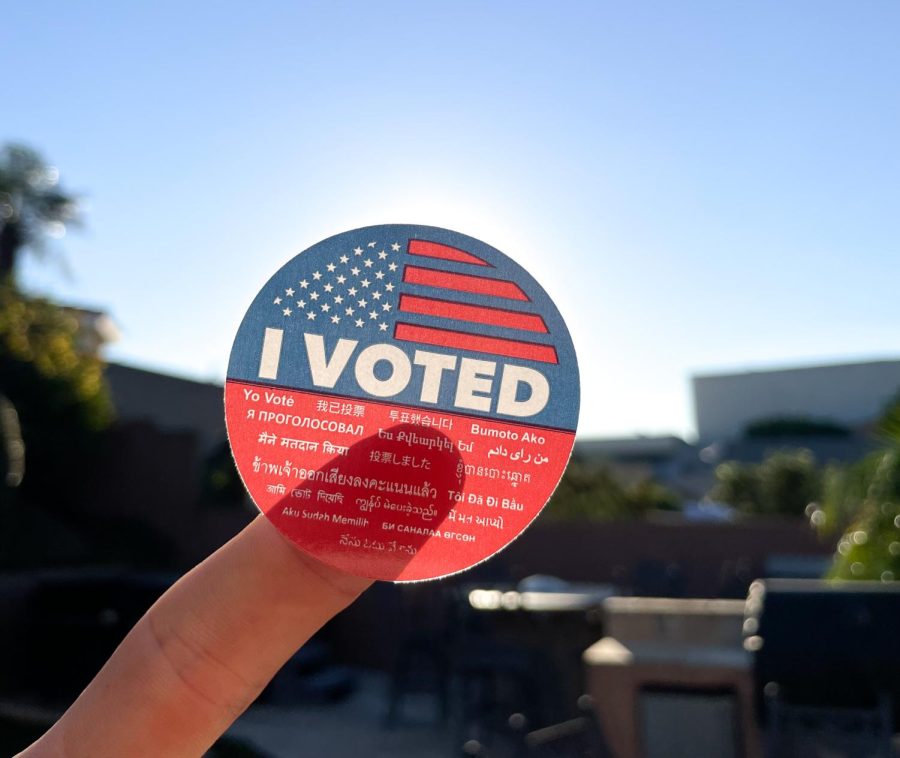 An+I+Voted+sticker+glimmers+in+the+sunlight+in+Torrance%2C+California%2C+on+Tuesday%2C+Oct.+18.+Students+and+employees+should+expect+the+campus+to+be+busier+in+the+next+few+weeks+for+the+Midterm+Election.+%28Ethan+Cohen+%7C+The+Union%29
