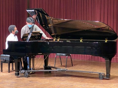 Daniel Hsu teaches student pianist Samuel Price about the importance of repetition when playing Sonata quasi una fantasia in C-sharp minor by Ludwig van Beethoven during his master class session held in HAAG Recital Hall on Oct. 6. Hsu utilizes his vast to help El Camino College pianists progress as musicians. (Khoury Williams | The Union)