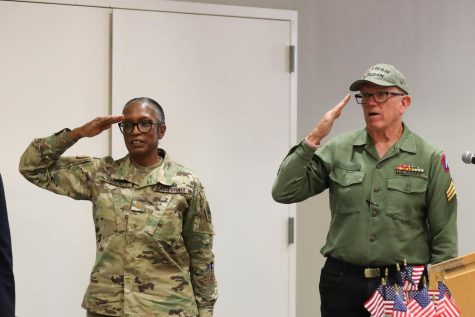 Maj. Brenda Threatt and former El Camino College Dean of I-Tech and U.S. Army veteran Sgt. Ronald Way renders a salute during The Pledge of Allegiance at a Veterans Day event on Thursday, Nov. 10 at El Camino’s East Dining Room. (Greg Fontanilla | The Union)