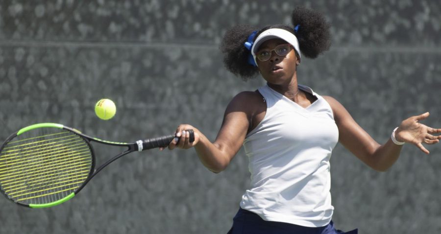 El Camino College Warriors womens tennis player Kayla Brown hits a forehand groundstroke at the Bakersfield Racquet Club in Bakersfield, California, on Saturday, April 23, 2022. The womens tennis teams 2023 season has been canceled after taking home the state title only one year prior. (Naoki Gima | The Union)