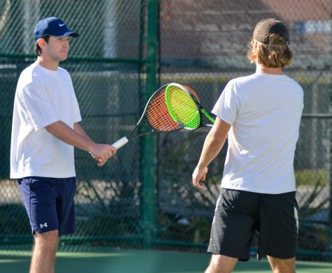 El Camino's Ben Horodner (left) and Josh Holman (right), bump their tennis rackets to show support with their match against Imperial Valley. El Camino College deafeated Imperial Valley at home on March 2. Ash Hallas | The Union