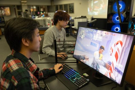Computer science major Riley Mayuga (front) and business major Casey Nykaza (back) play a practice match of "Valorant" together to prepare for the next College tournament game. The "Valorant" esports team is 2-1 overall in its current season. (Khoury Williams | The Union)