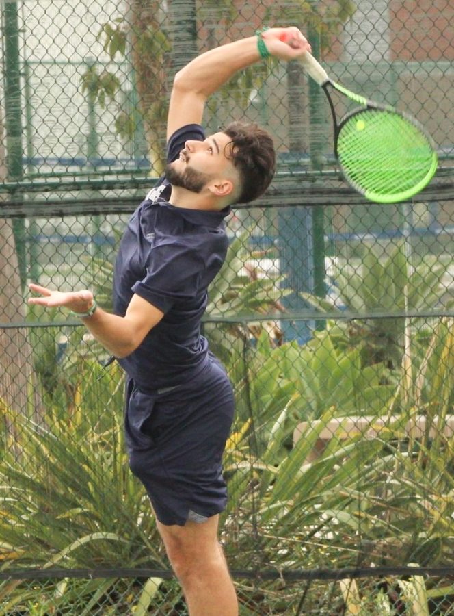 El Caminos Hector Uribe serves the ball during a singles match at home on March 30 against the Mounties of Mt. San Antonio College. El Caminos two-win streak was snapped after a 7-2 loss against the Mounties. (Bryan Sanchez | The Union)